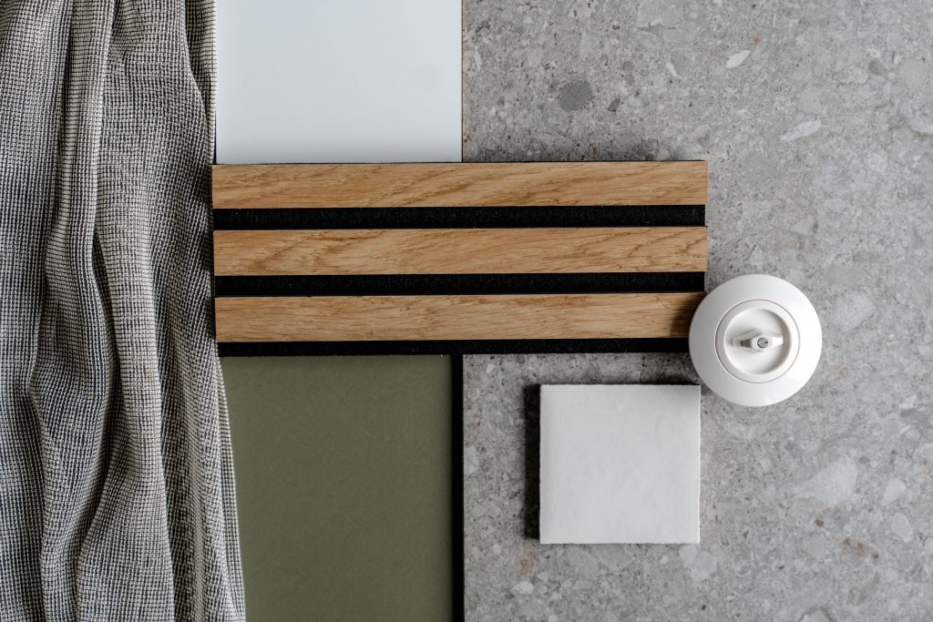 STARTBILD_KonzeptK_Ferienwohnung-QuartieramStrand,Whg.03_Materialcollage